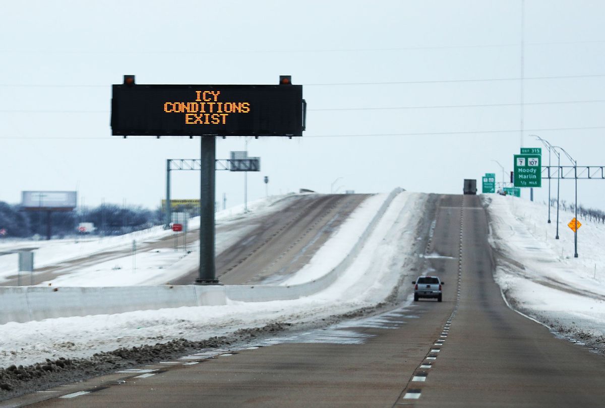A sign warns of icy conditions on Interstate Highway 35 on February 18, 2021 in Killeen, Texas. Winter storm Uri has brought historic cold weather and power outages to Texas as storms have swept across 26 states with a mix of freezing temperatures and precipitation. (Joe Raedle/Getty Images)