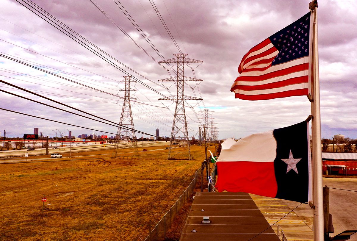 The U.S. and Texas flags fly in front of high voltage transmission towers on February 21, 2021 in Houston, Texas. Millions of Texans lost power when winter storm Uri hit the state and knocked out coal, natural gas and nuclear plants that were unprepared for the freezing temperatures brought on by the storm. Wind turbines that provide an estimated 24 percent of energy to the state became inoperable when they froze. (Justin Sullivan/Getty Images)