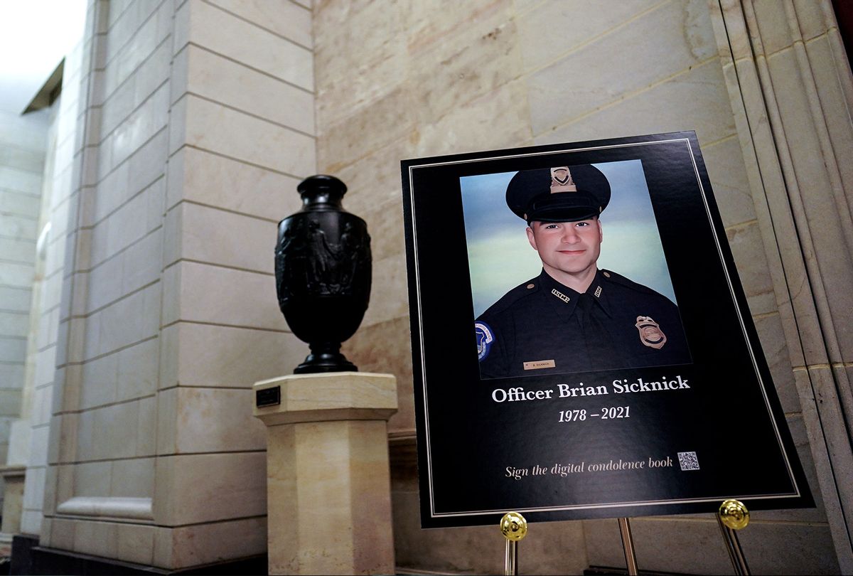 A sign just outside the Rotunda memorializes U.S. Capitol Police Officer Brian D. Sicknick, 42, who will lie in honor in the Rotunda of the Capitol beginning on Tuesday evening, February 2, 2021. Officer Sicknick was responding to the riot at the U.S. Capitol on Wednesday, January 6, 2021, when he was fatally injured while physically engaging with the mob. Members of Congress will pay tribute to the officer on Wednesday morning before his burial at Arlington National Cemetery. (Salwan Georges/The Washington Post via Getty Images)