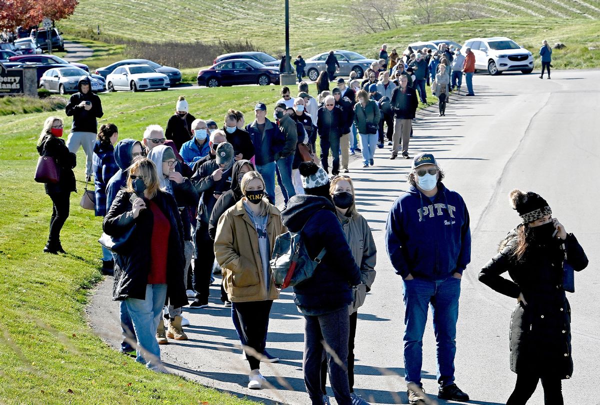 Hundreds of voters lined up early in Cranberry, Pennsylvania at the Cranberry Highlands Golf Course on November 03, 2020. Many did not trust early voting (especially fears of mail delays) and opted to vote on election day in person. The average wait time here was two hours. (Michael S. Williamson/The Washington Post via Getty Images)