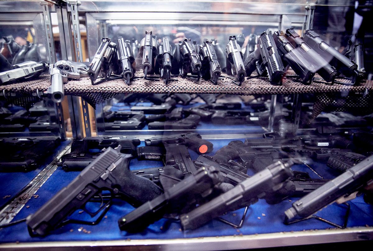 Assorted pistols on display (Samuel Corum/Anadolu Agency/Getty Images)