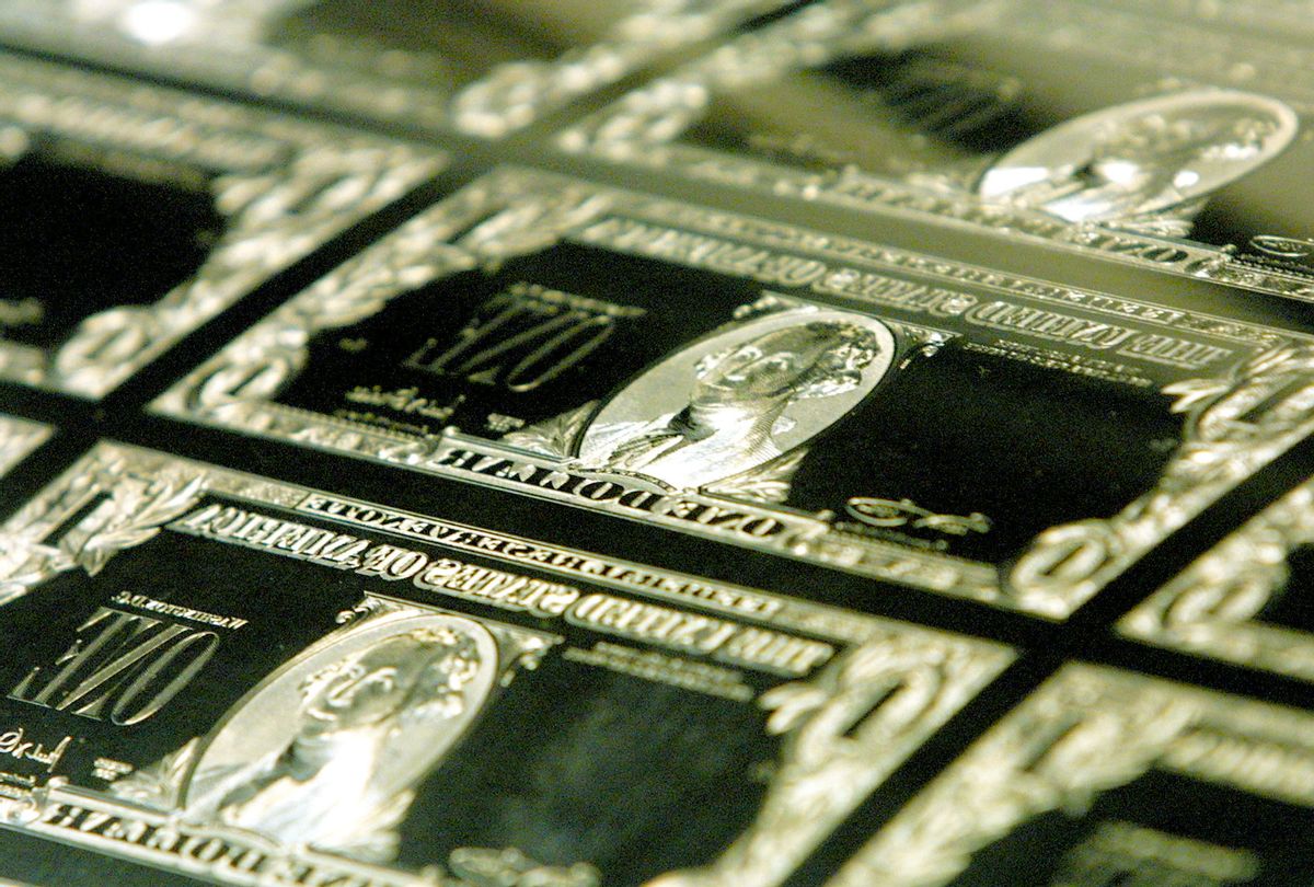 The plates used to print the new Series 2001 one dollar bill notes are stored November 21, 2001 at the Bureau of Engraving and Printing in Washington, DC. The new dollar bills contain the signatures of U.S. Treasury Secretary Paul O''Neill and U.S. Treasurer Rosario Marin. (Alex Wong/Getty Images)