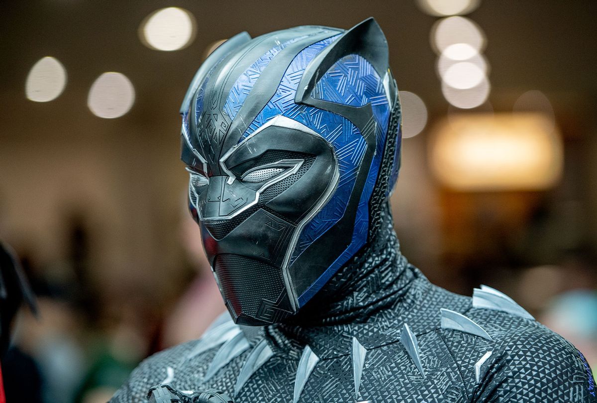 A fan cosplays as Black Panther, a Marvel Comics character originally created by Stan Lee and Jack Kirby (Roy Rochlin/Getty Images)