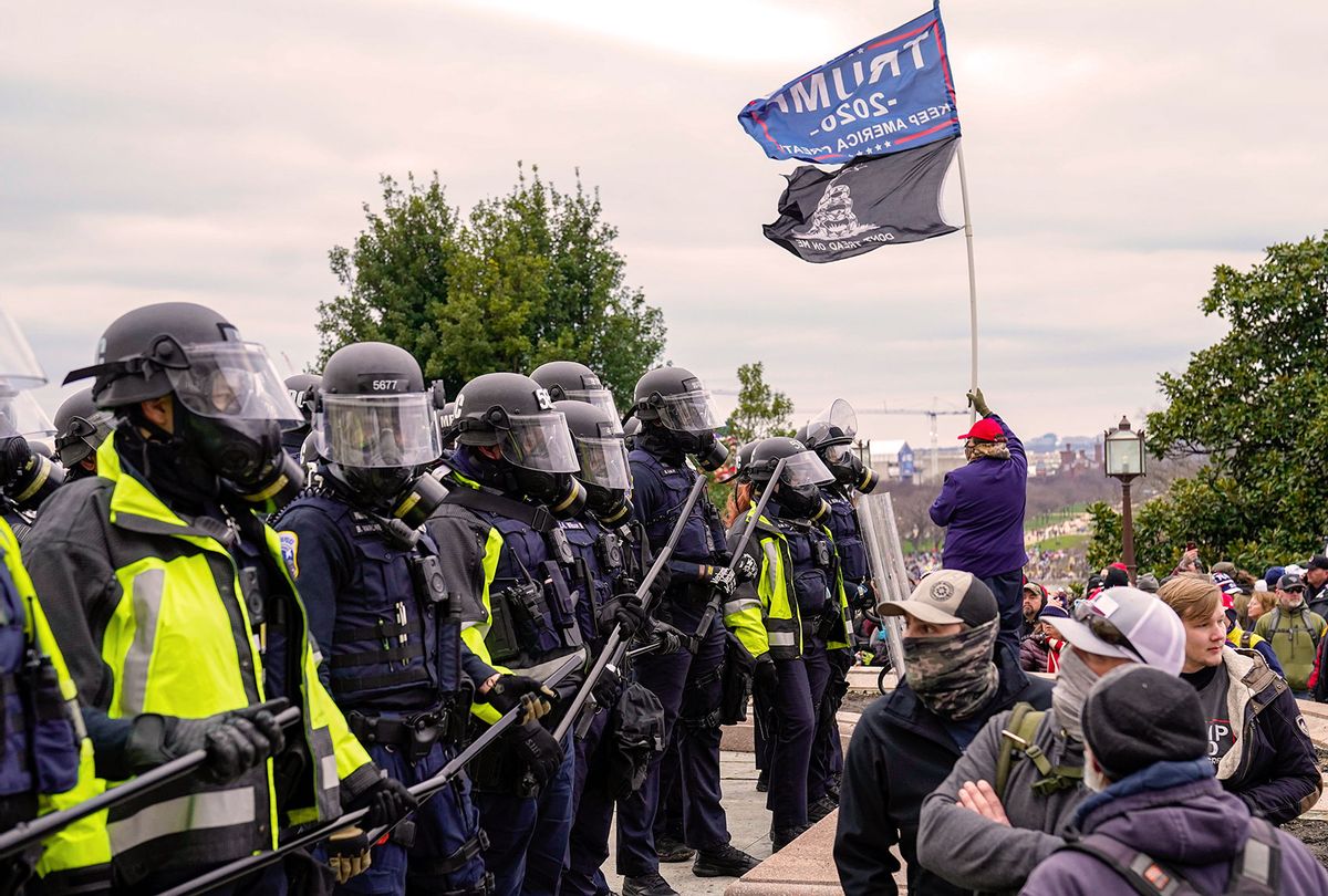 Capitol Hill police hold back protesters as crowds gather outside the U.S. Capitol for the "Stop the Steal" rally on January 06, 2021 in Washington, DC. Trump supporters gathered in the nation's capital today to protest the ratification of President-elect Joe Biden's Electoral College victory over President Trump in the 2020 election. (Robert Nickelsberg/Getty Images)