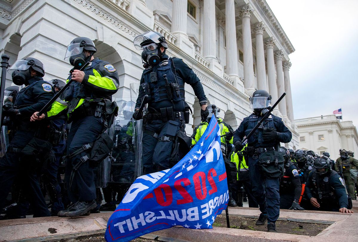 Pro-Trump protestors clash with police during the tally of electoral votes that would certify Joe Biden as the winner of the U.S. presidential election outside the US Capitol in Washington, DC on Wednesday, January 6, 2021. (Amanda Andrade-Rhoades/For The Washington Post via Getty Images)
