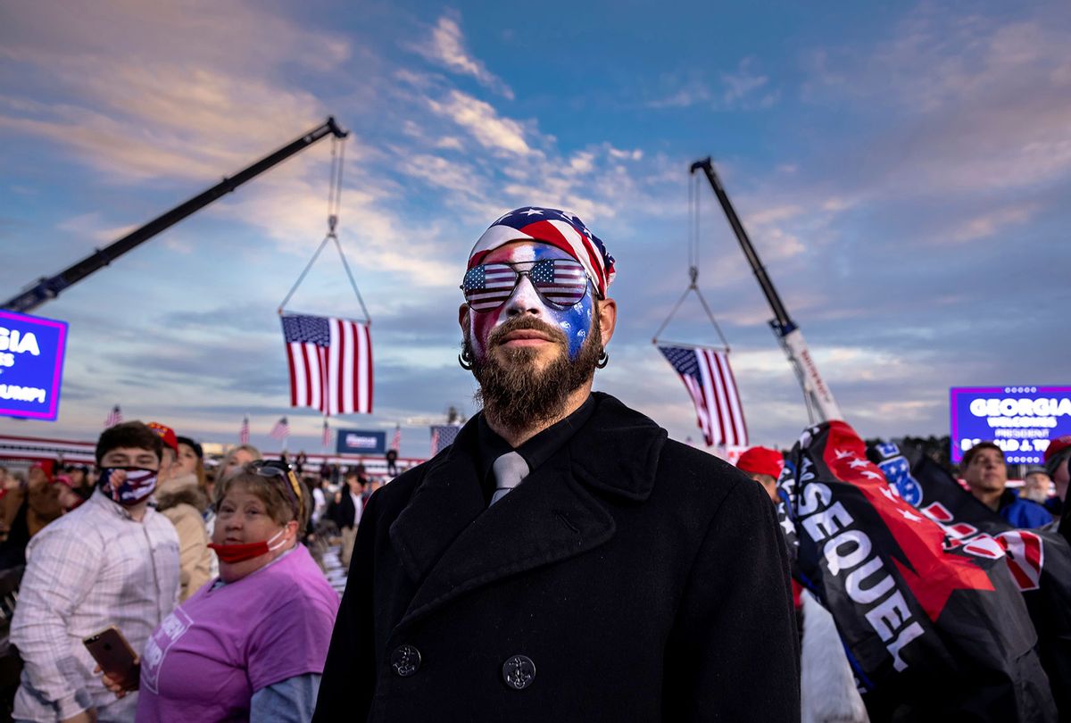 Jacob Anthony Angeli Chansley, known as the QAnon Shaman, is seen at a Trump rally in Dalton, Georgia on the 4th of January. He attended the Capitol riots on the 6th of January in Washington, DC. (Brent Stirton/Getty Images)