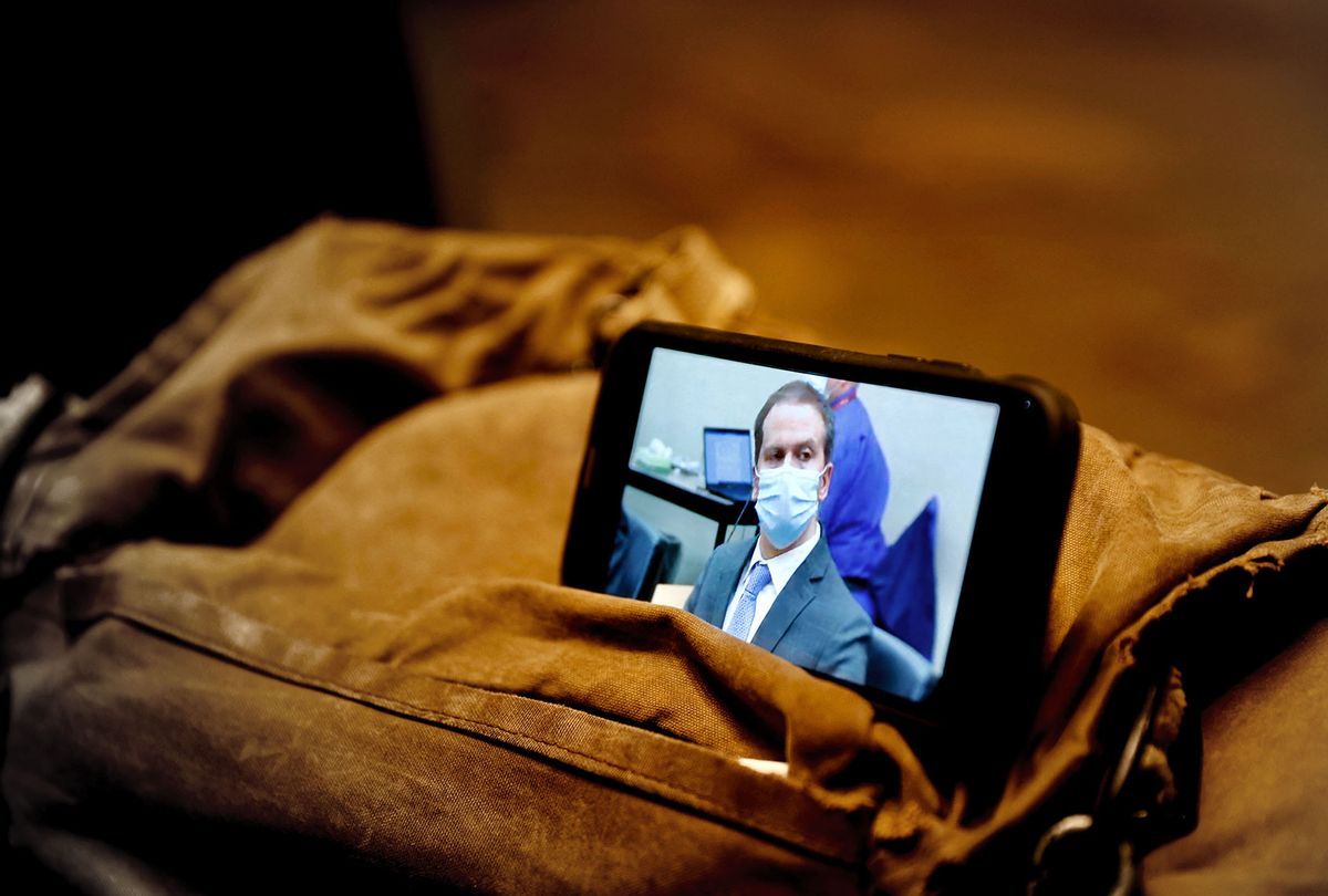 A journalist watches their mobile phone showing Derek Chauvin as the verdict in his trial over the death of George Floyd is announced in Minneapolis, Minnesota on April 20, 2021. - Sacked police officer Derek Chauvin was convicted of murder and manslaughter on april 20 in the death of African-American George Floyd in a case that roiled the United States for almost a year, laying bare deep racial divisions. (KEREM YUCEL/AFP via Getty Images)