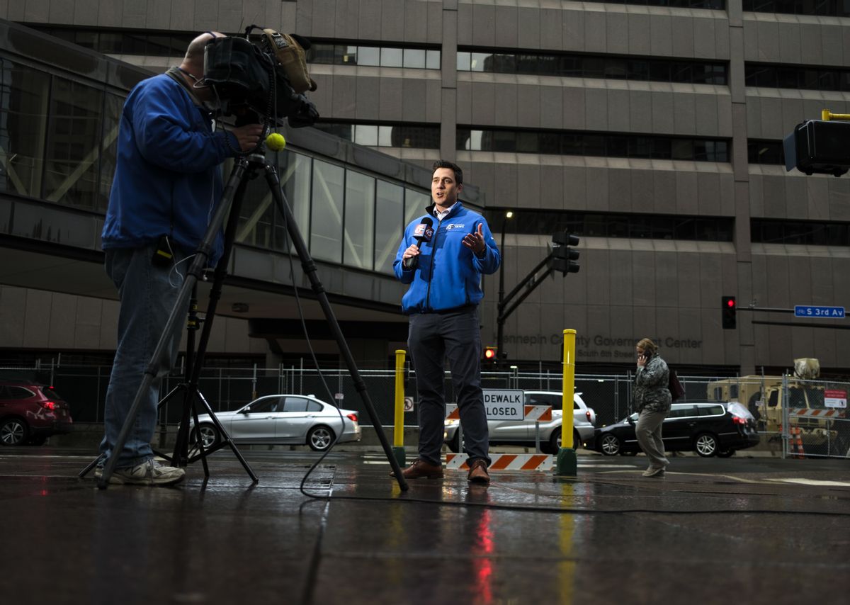 A local news team broadcasts outside the Hennepin County Government Center on April 8, 2021 in Minneapolis, Minnesota.  (Stephen Maturen/Getty Images)