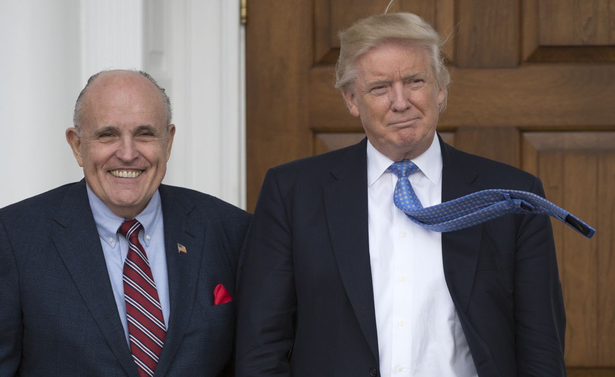 Former President Donald Trump, right, with former New York City Mayor Rudy Giuliani. (DON EMMERT/AFP via Getty Images)