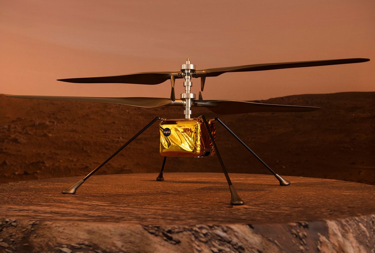 A full scale model of the experimental Ingenuity Mars Helicopter, which will be carried under the Mars 2020 Perseverance rover, is displayed at NASA's Jet Propulsion Laboratory (JPL) on February 16, 2021 in Pasadena, California. - The Mars exploration rover will search for signs of ancient microbial life and collect rock samples for future return to Earth to study the red planet's geology and climate, paving the way for human exploration. Perseverance also carries the experimental Ingenuity Mars Helicopter - which will attempt the first powered, controlled flight on another planet. (PATRICK T. FALLON/AFP via Getty Images)