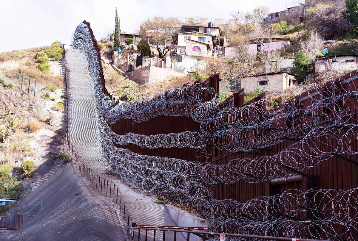 Concertina wire, added by U.S. Army troops, is seen covering the US-Mexico border wall in Nogales, Arizona (Max Herman/NurPhoto via Getty Images)
