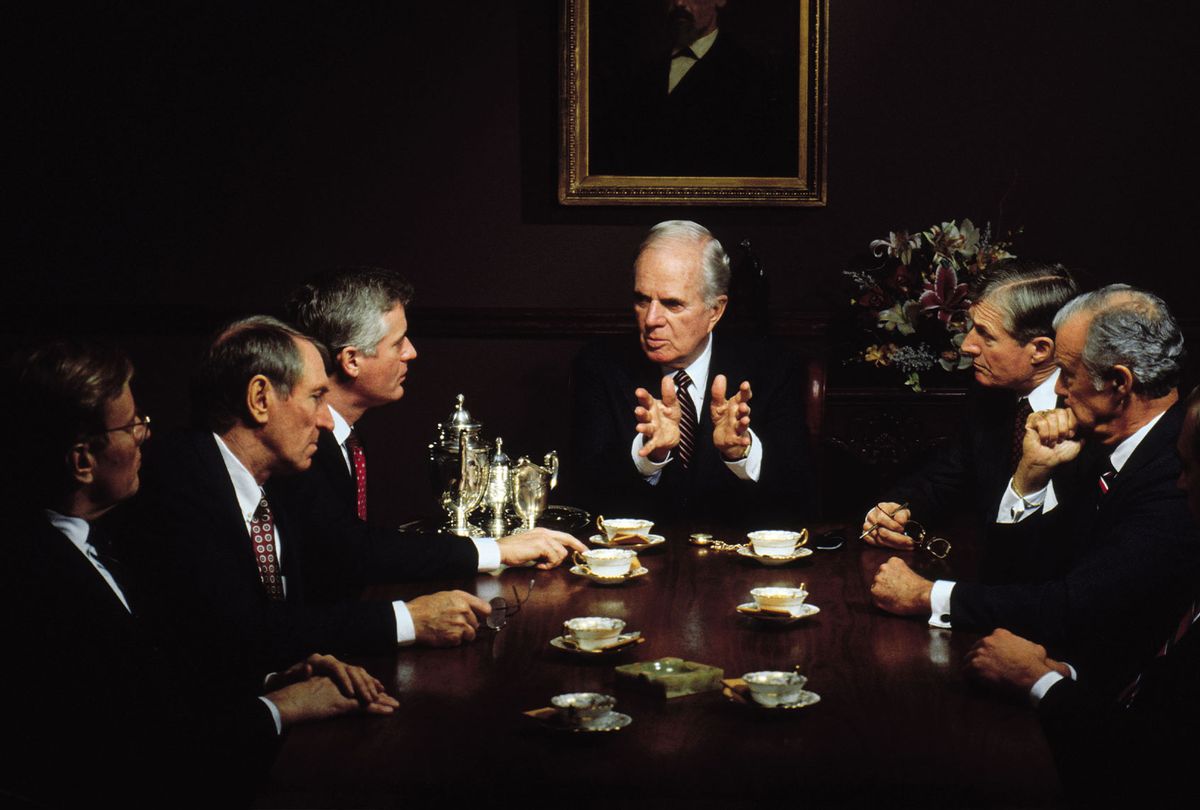 Rich old men in a meeting (Getty Images)