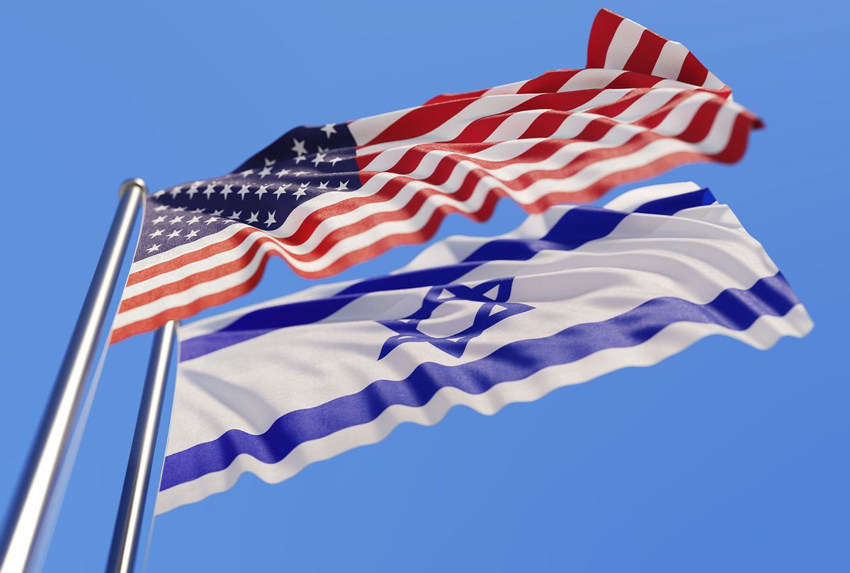 American And Israeli Flags Waving With Wind On Blue Sky (Getty Images)