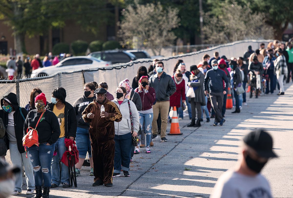People wait in line to participate in early voting on October 31, 2020 in Greenville, South Carolina. Election Day is November 3. (Sean Rayford/Getty Images)