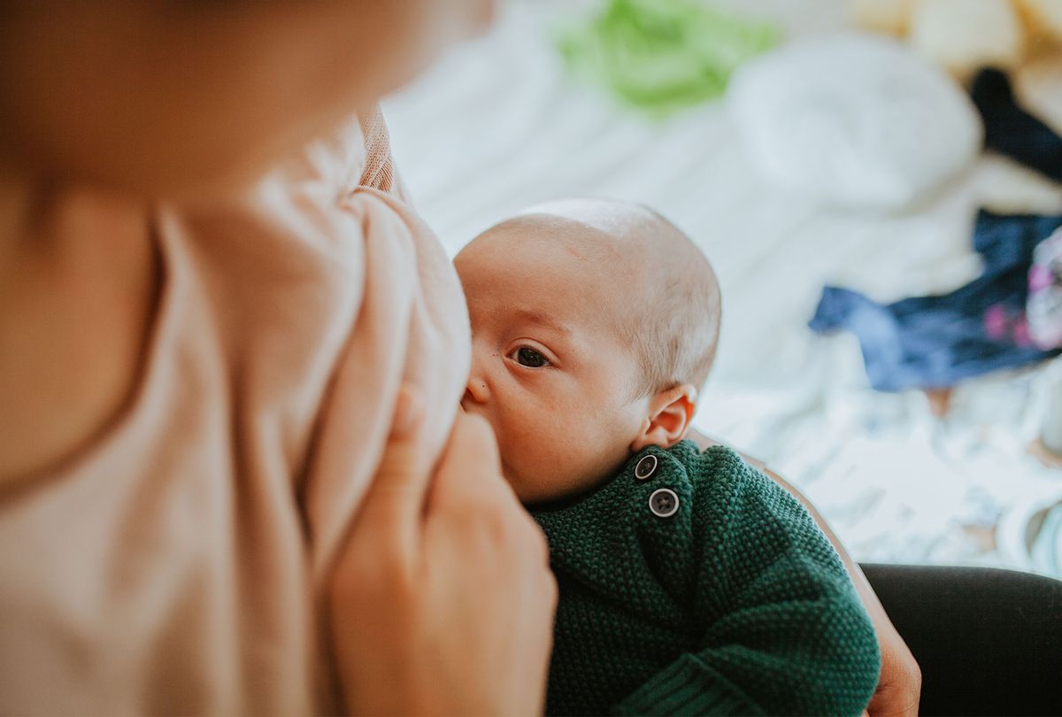 Mother Breastfeeding Baby (Getty Images)