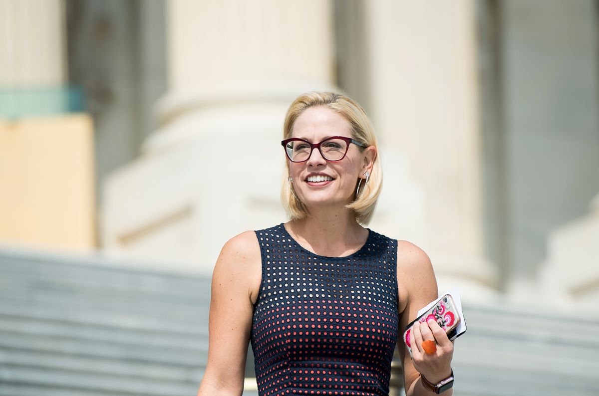 Multi-amount marketing and advertising companies shower Kyrsten Sinema with hard cash, in obvious bid to get rid of labor invoice