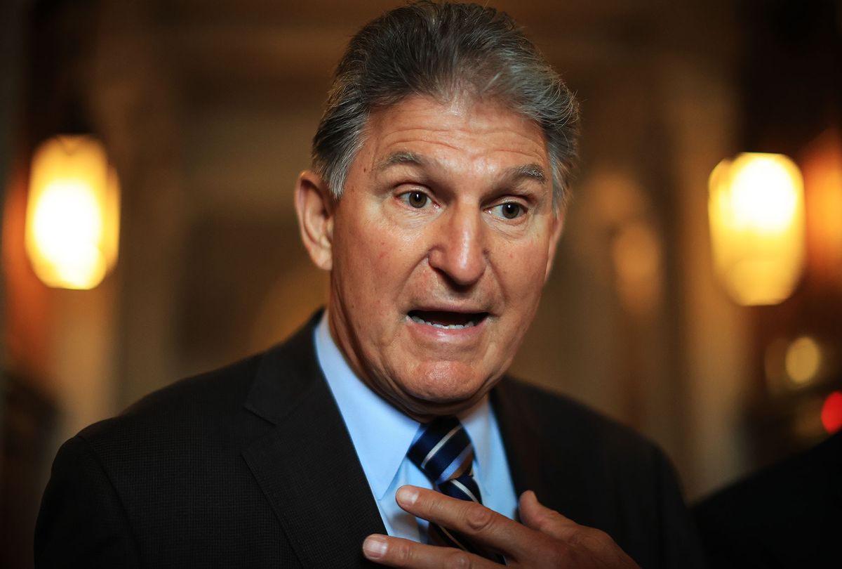 Sen. Joe Manchin (D-WV) talks with reporters after stepping off the Senate Floor at the U.S. Capitol on May 28, 2021 in Washington, DC. (Chip Somodevilla/Getty Images)