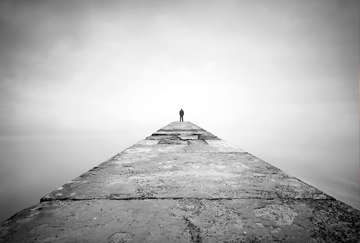 Man on the edge of pier (Getty Images)
