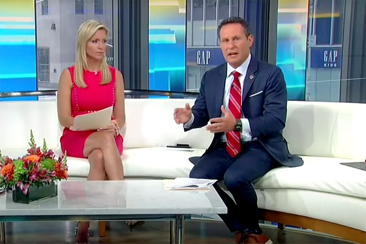 Brian Kilmeade and Ainsley Earhardt discuss critical race theory on Fox and Friends. (Getty Images)