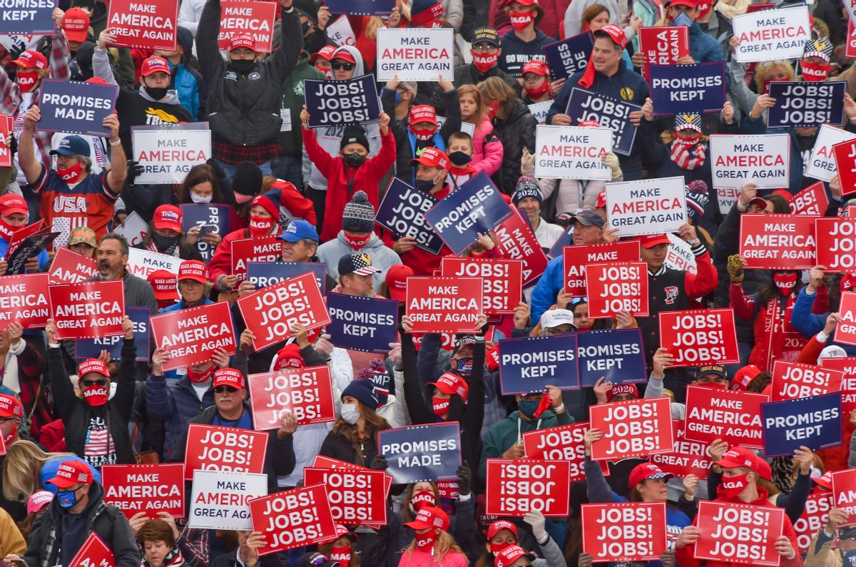 Supporters of then-President Donald Trump hold signs at a rally in Pennsylvania. (Getty Images)