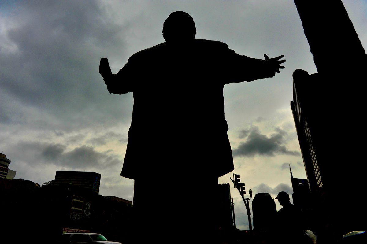 A 7-foot tall statue (with a 17-foot tall cross) of evangelist Billy Graham graces the front entrance to the headquarters of the Southern Baptist Convention in Nashville. (Getty Images)