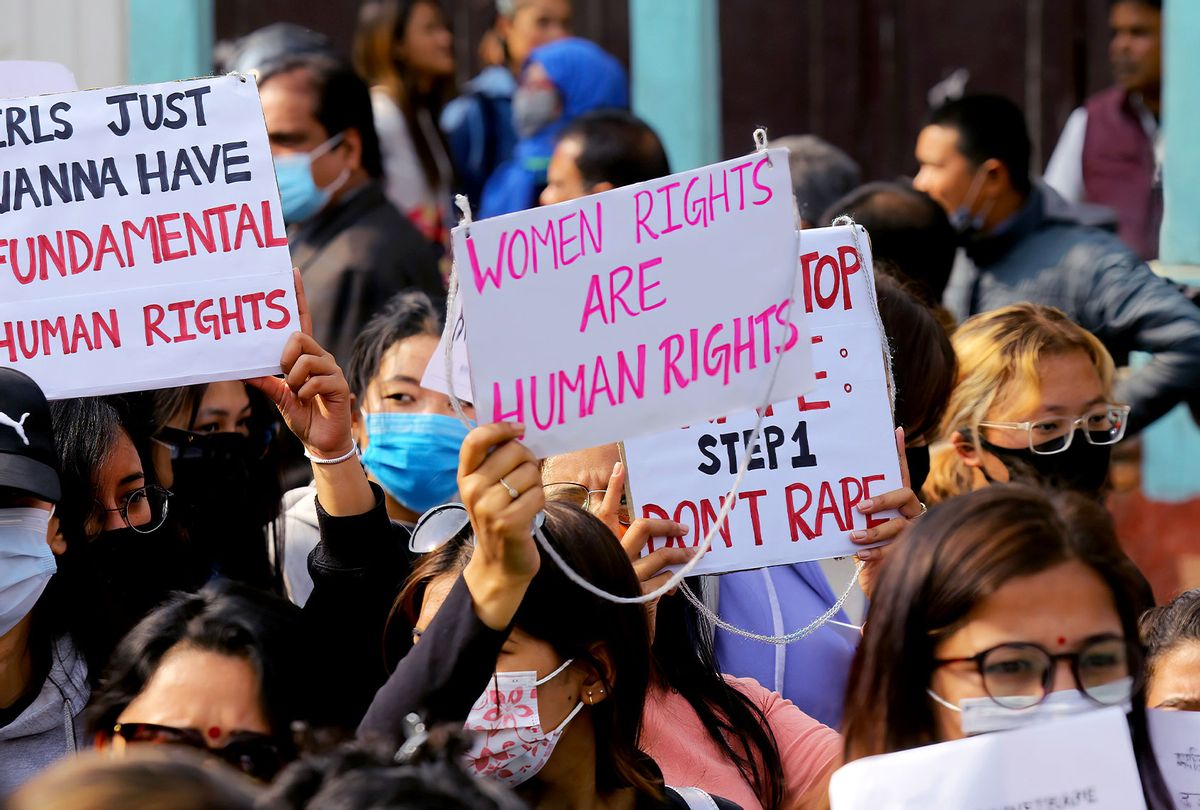 Activists hold placards during a demonstration (Sunil Pradhan/SOPA Images/LightRocket via Getty Images)
