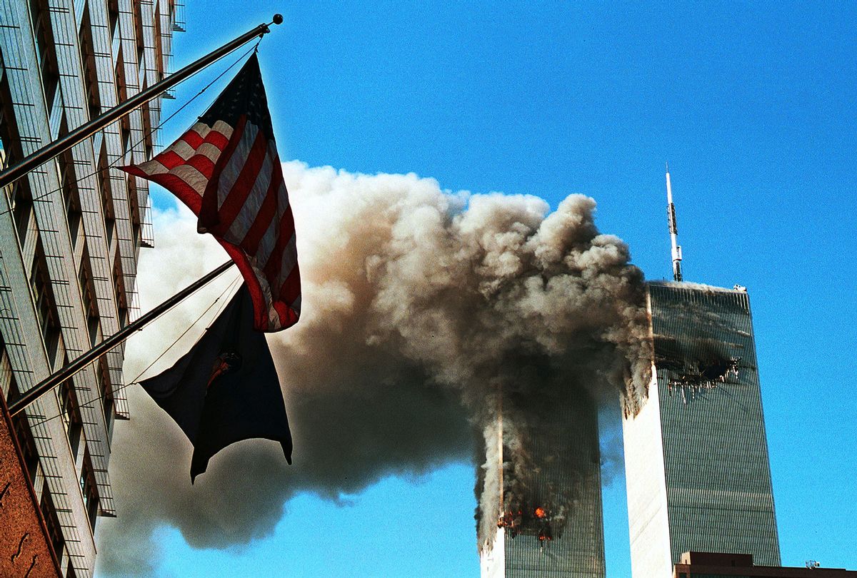 Smoke Pours From The World Trade Center After Being Hit By Two Planes September 11, 2001 In New York City. (Craig Allen/Getty Images)