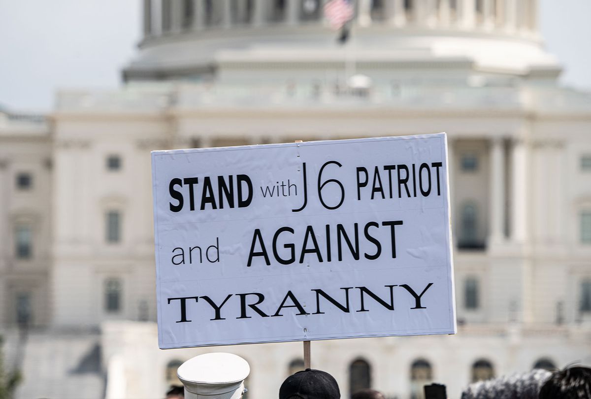"Stand with J6 Patriot and Against Tyranny" reads the sign. A sparse crowd gathered near the nation’s Capitol to rally for those criminally charged in the January 6 deadly pro-Trump insurrection, in Washington D.C. on Saturday Sept. 18, 2021. (Photo by Jeff Malet Photography)