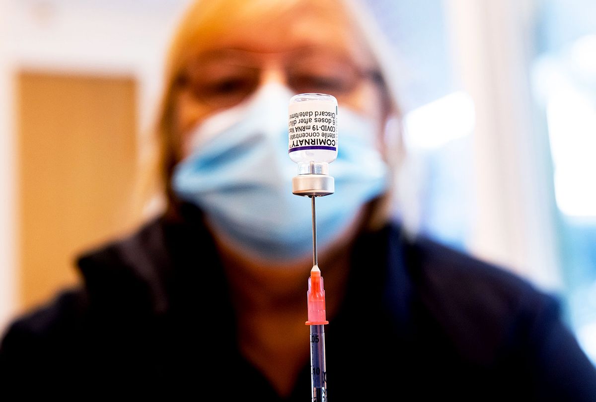 Close up of a Pfizer booster vaccine on the day that the vaccination campaign with Pfizer's third booster shot has started on October 6, 2021 in Utrecht, Netherlands. (Patrick van Katwijk/BSR Agency/Getty Images)