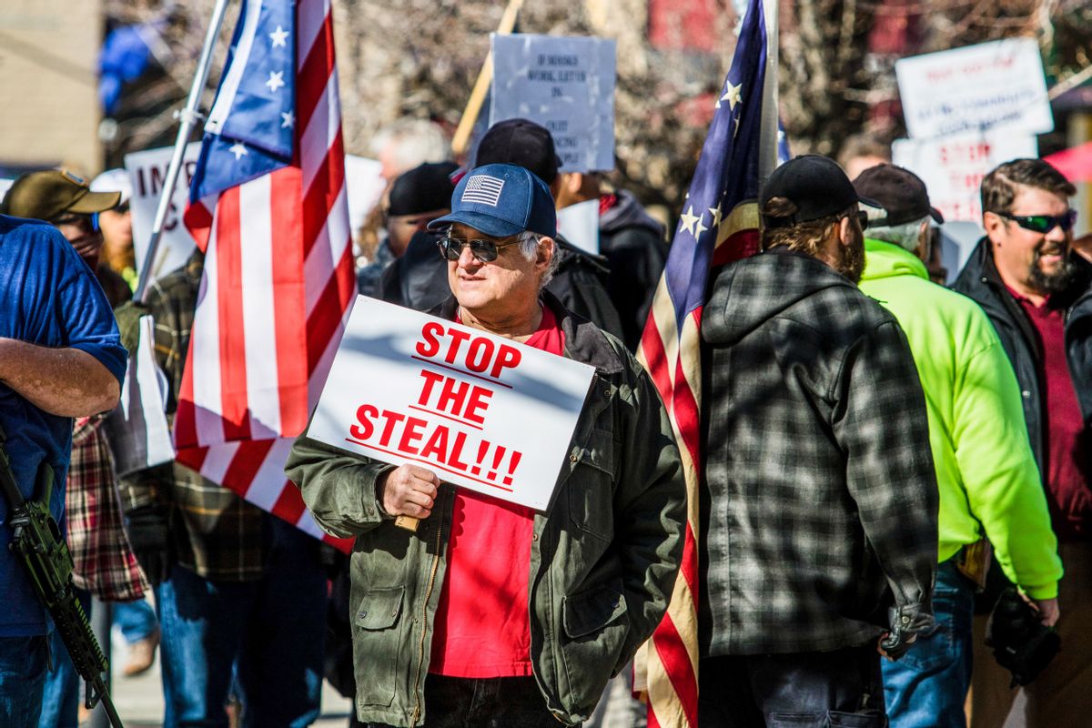 A protestor holds a placard saying Stop the steal during a demonstration in Nevada. (Ty O'Neil/SOPA Images/LightRocket via Getty Images)