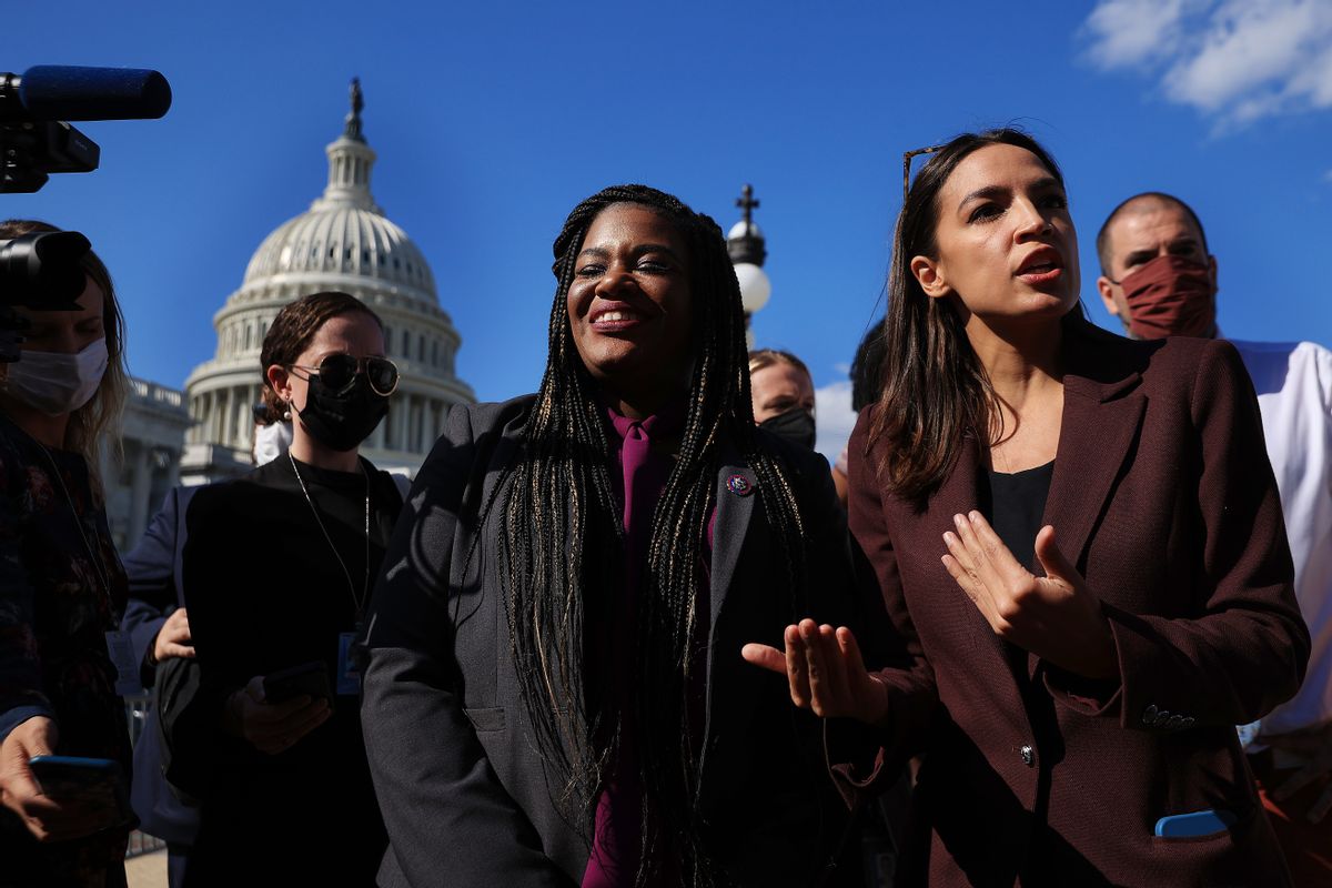 Congressional Progressive Caucus members Rep. Cori Bush, D-Mo., and Rep. Alexandria Ocasio-Cortez, D-N.Y., talk to reporters outside the U.S. Capitol on Sept. 30, 2021. (Chip Somodevilla/Getty Images)