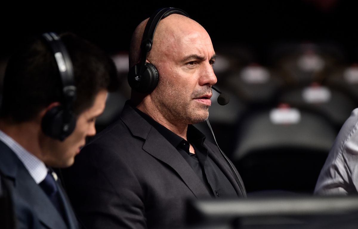 Joe Rogan is seen in the commentary booth during the UFC 220 event at TD Garden on January 20, 2018 in Boston, Massachusetts. (Jeff Bottari/Zuffa LLC/Zuffa LLC via Getty Images)