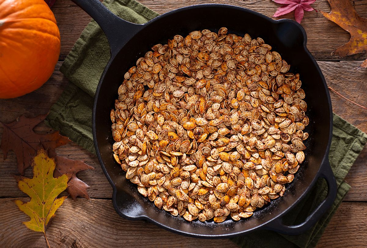 Roasted Pumpkin Seeds in a Cast Iron Skillet (Getty Images/rudisill)