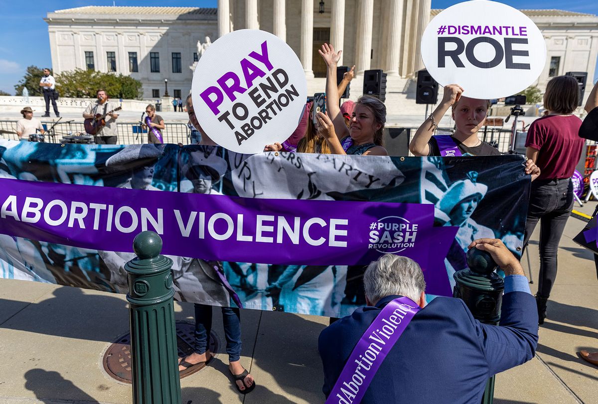 Anti-Abortion activists gather in oppostion in front of the supreme court during the annual Women’s March October 2, 2021 in Washington, DC. The Women's March and other groups organized marches across the country to protest the new abortion law in Texas. (Tasos Katopodis/Getty Images)