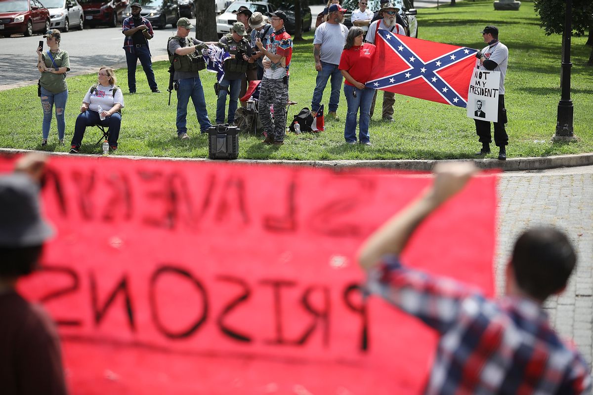 About 20 members and supporters of Confederate heritage groups rally in Richmond, Virginia. (Getty Images)