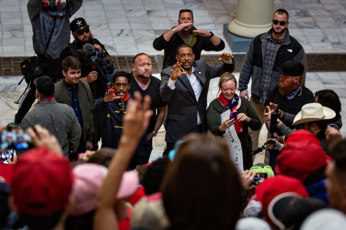 From right: Vernon Jones, Democratic Party member of the Georgia House of Representatives along with and conspiracy theorist Alex Jones and Ali Alexander, organizer for Stop the Steal, gather at the Georgia Capitol Building on Wednesday, Nov. 18, 2020 in Atlanta, Georgia. (Jason Armond / Los Angeles Times via Getty Images)
