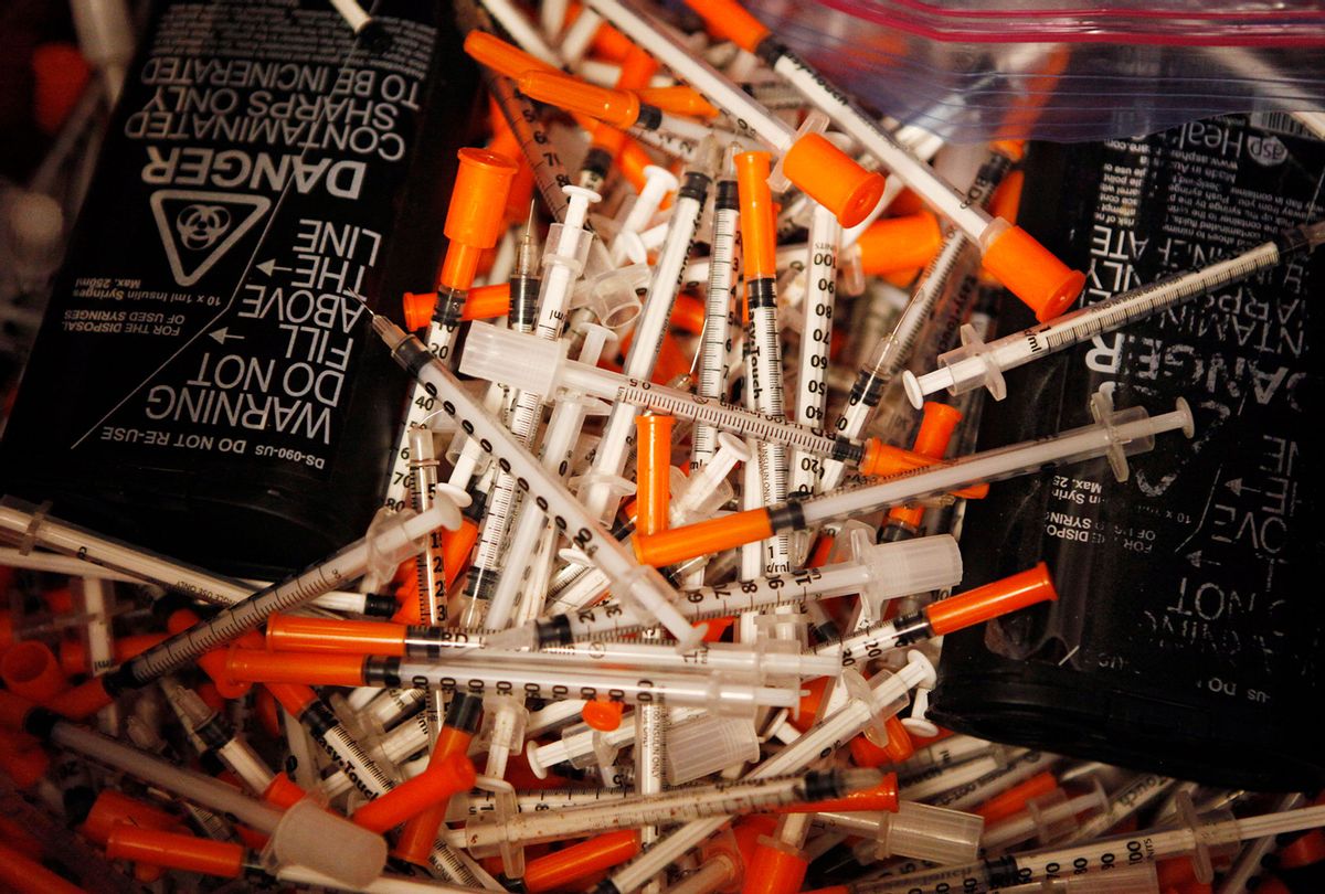 Used hypodermic needles are seen in a bin at the India Street Public Health Center Needle Exchange in Portland, Maine. (Joel Page/Portland Portland Press Herald via Getty Images)
