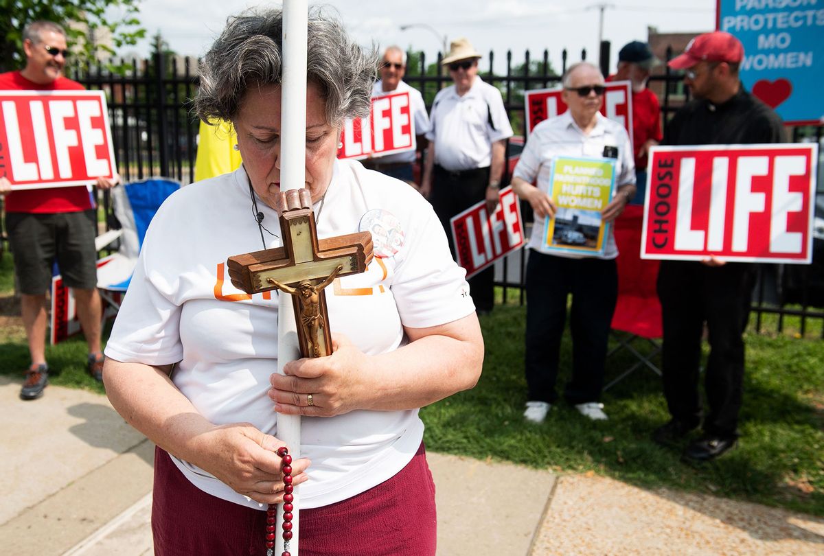 Anti-abortion demonstrators hold a protest outside the Planned Parenthood Reproductive Health Services Center in St. Louis, Missouri, May 31, 2019, the last location in the state performing abortions. (SAUL LOEB/AFP via Getty Images)