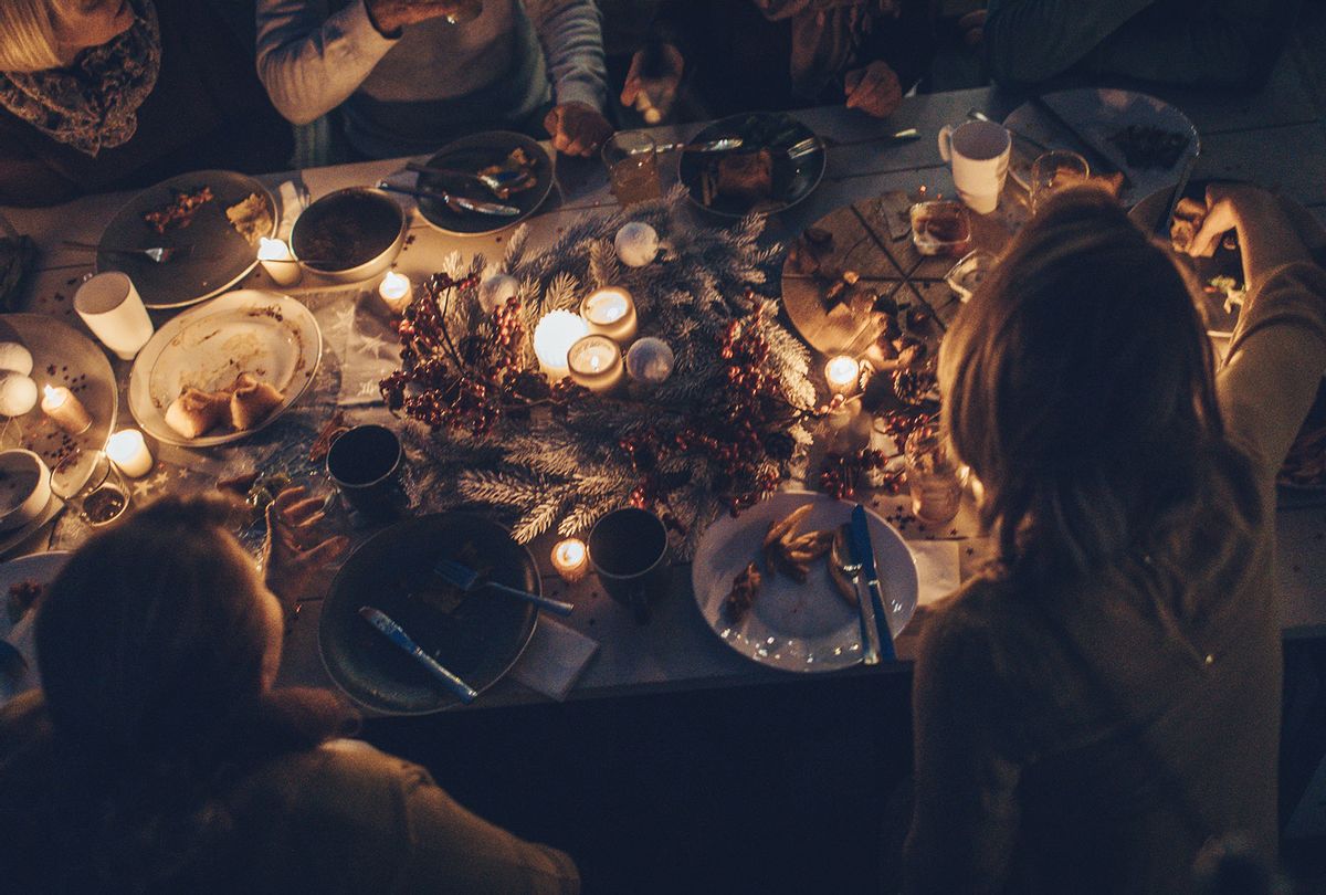 Family during Thanksgiving dinner (Getty Images/Aleksandar Nakic)