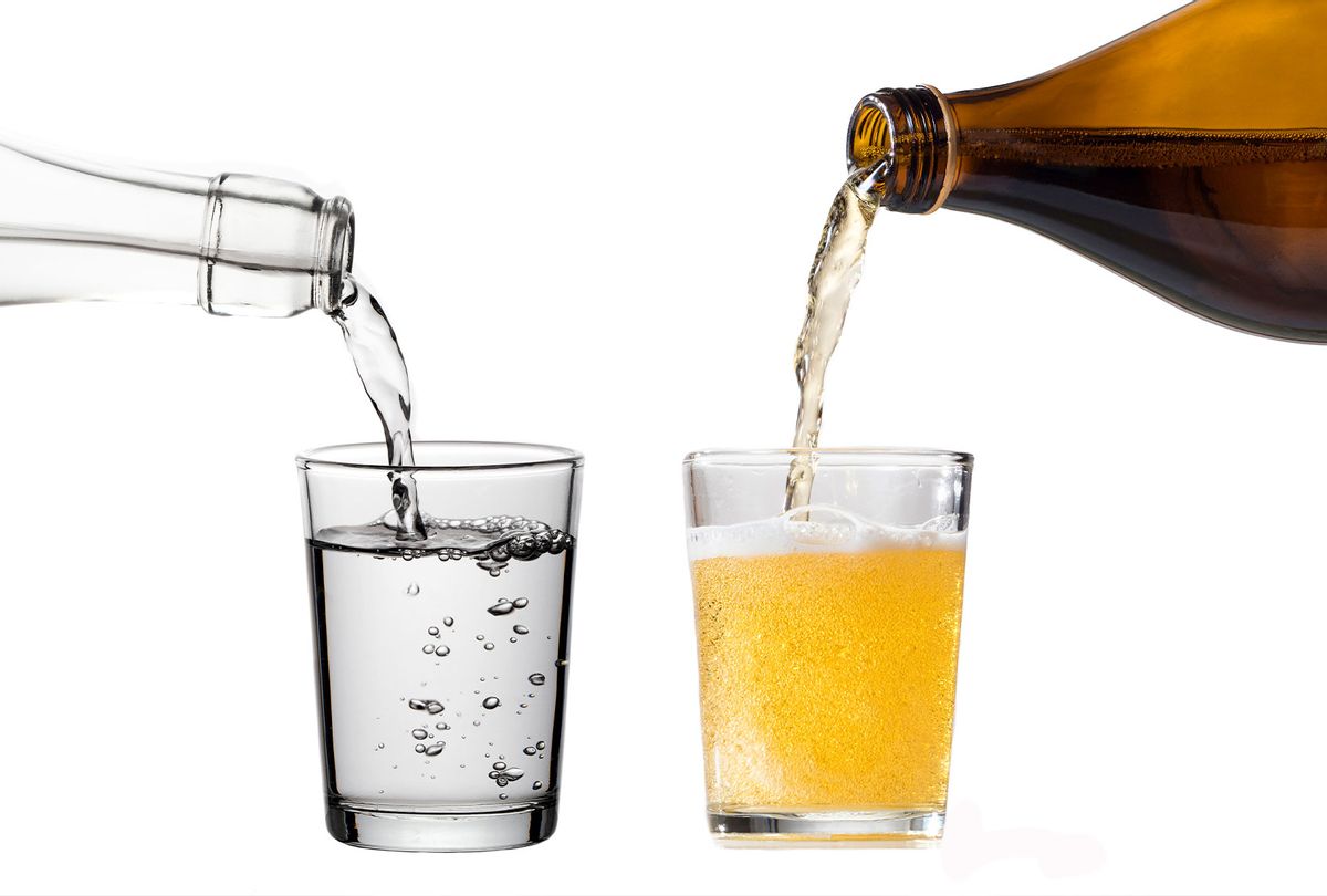 Glass of beer and a glass of water (Getty Images/Jose A. Bernat Bacete)