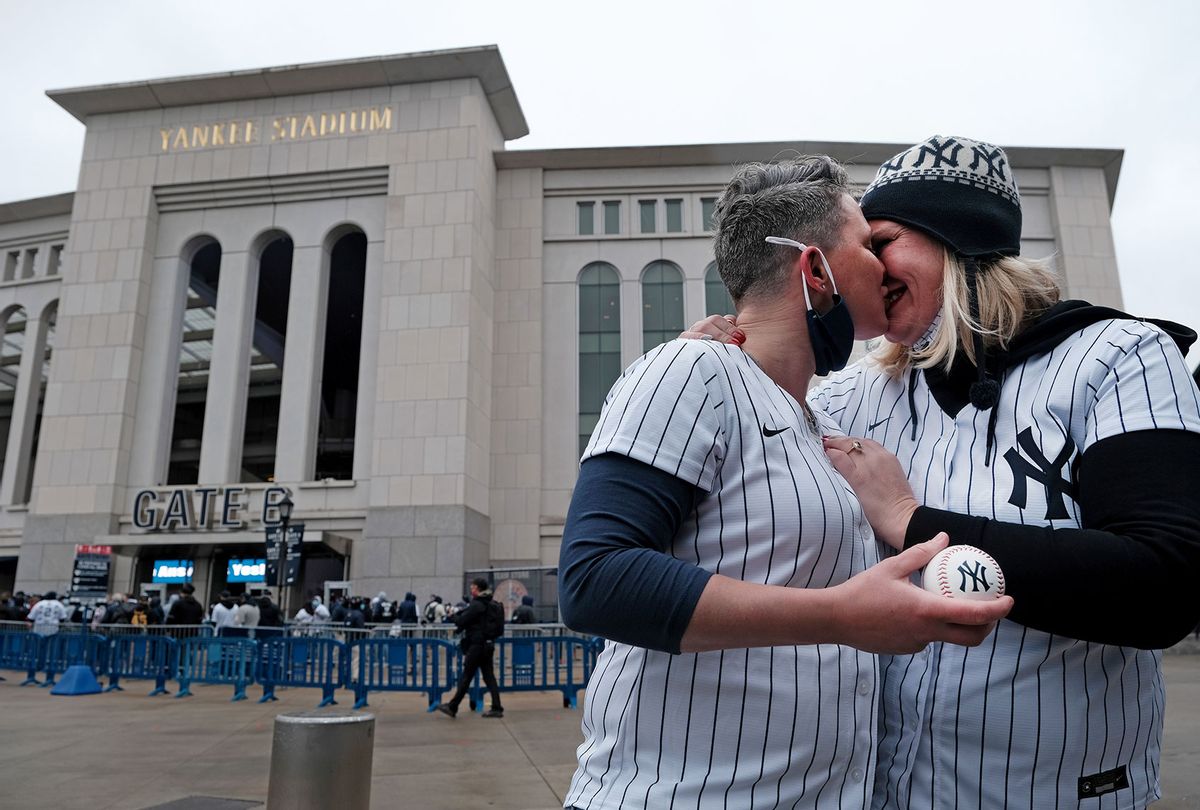 Vanessa Williams (left) proposes to her girlfriend Megan Coombs in front of Yankee Stadium in the Bronx on the Opening Day of baseball season on April 01, 2021 in New York City. The couple are both longtime Yankee fans. (Spencer Platt/Getty Images)