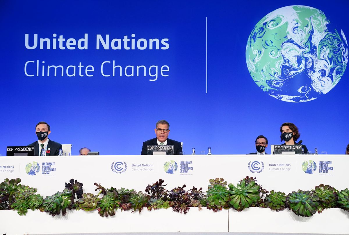 Alok Sharma (centre) President of the Cop26 climate summit, speaks during an informal stock taking plenary session, during an 'overun' day of the Cop26 summit in Glasgow. Picture date: Saturday November 13, 2021. (Jane Barlow/PA Images via Getty Images)