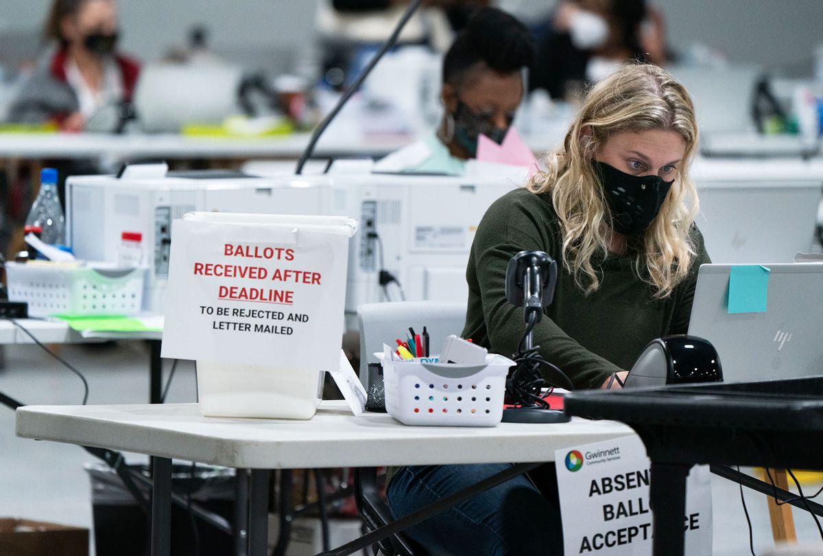 Election personnel check in provisional ballots at the Gwinnett County Board of Voter Registrations and Elections offices on November 7, 2020 in Lawrenceville, Georgia.  (Elijah Nouvelage/Getty Images)