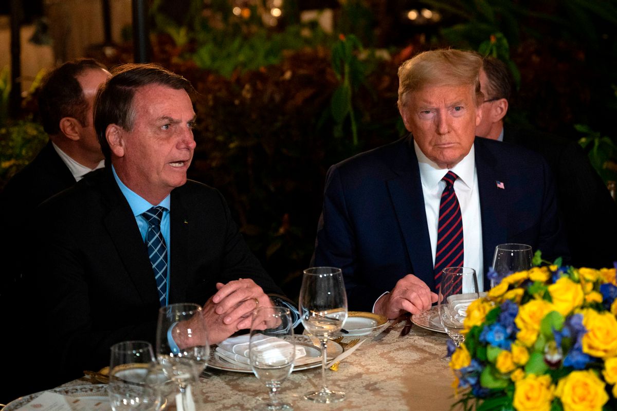 Then-President Donald Trump with Brazilian President Jair Bolsonaro at Mar-a-Lago in Palm Beach, Florida, on March 7, 2020. ( Jim Watson/AFP via Getty Images)