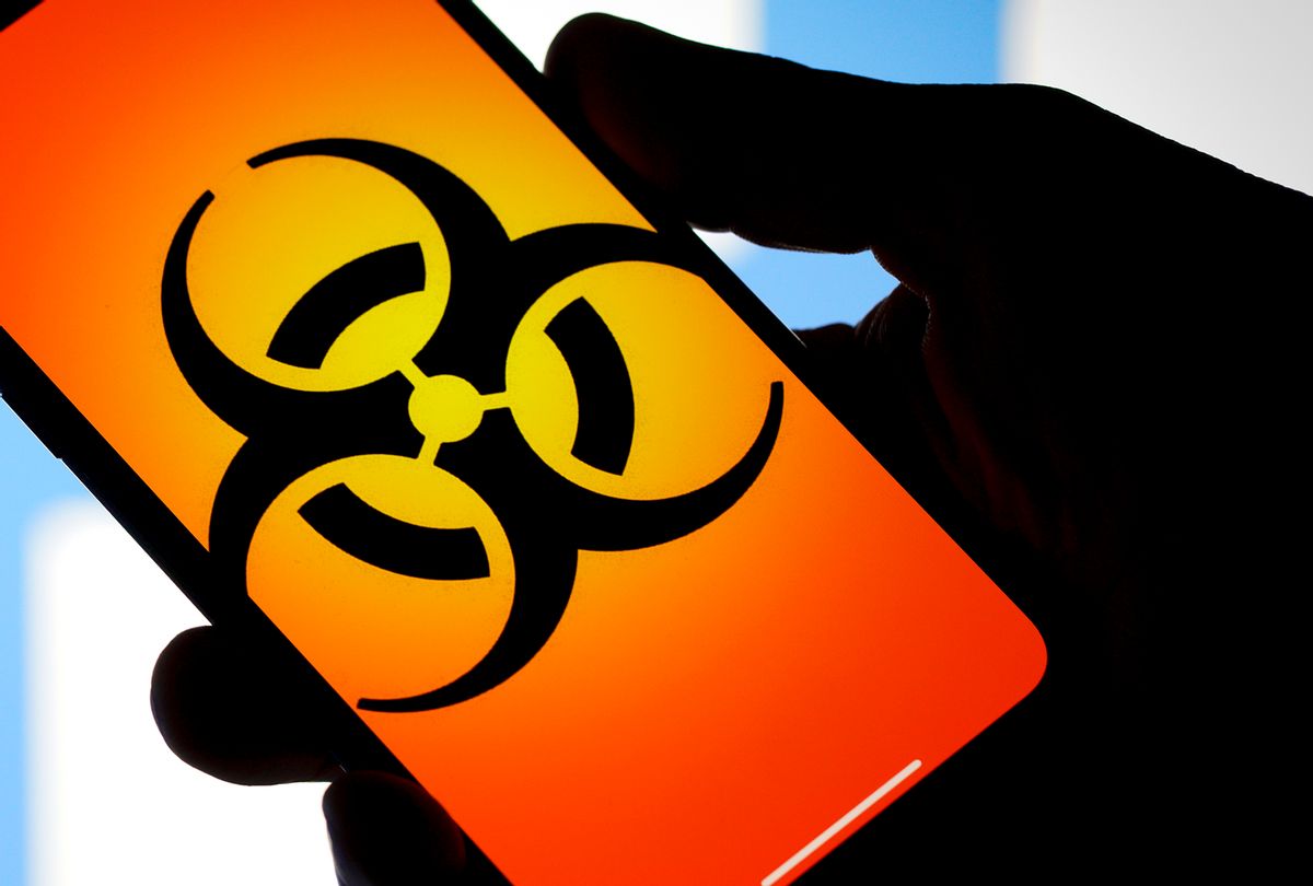 Biohazard sign on a phone. (Getty Images)