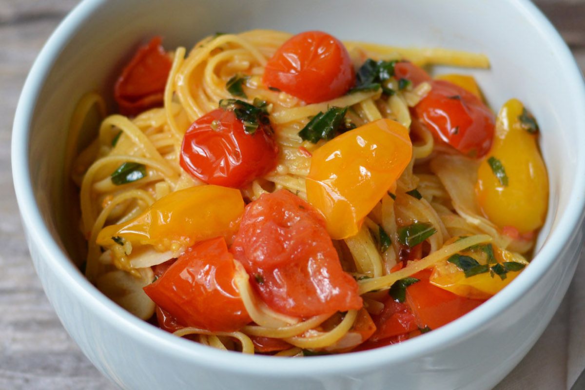 Simple and delish quinoa pasta with fresh tomatoes, garlic and basil. (Photo courtesy of the Institute of Culinary Education)