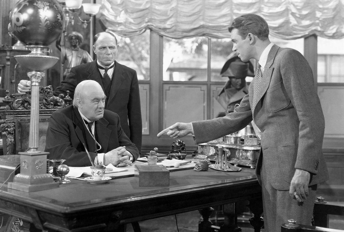James Stewart, as George Bailey, points at Lionel Barrymore in a scene from "It's a Wonderful Life" (Getty Images/Bettman)
