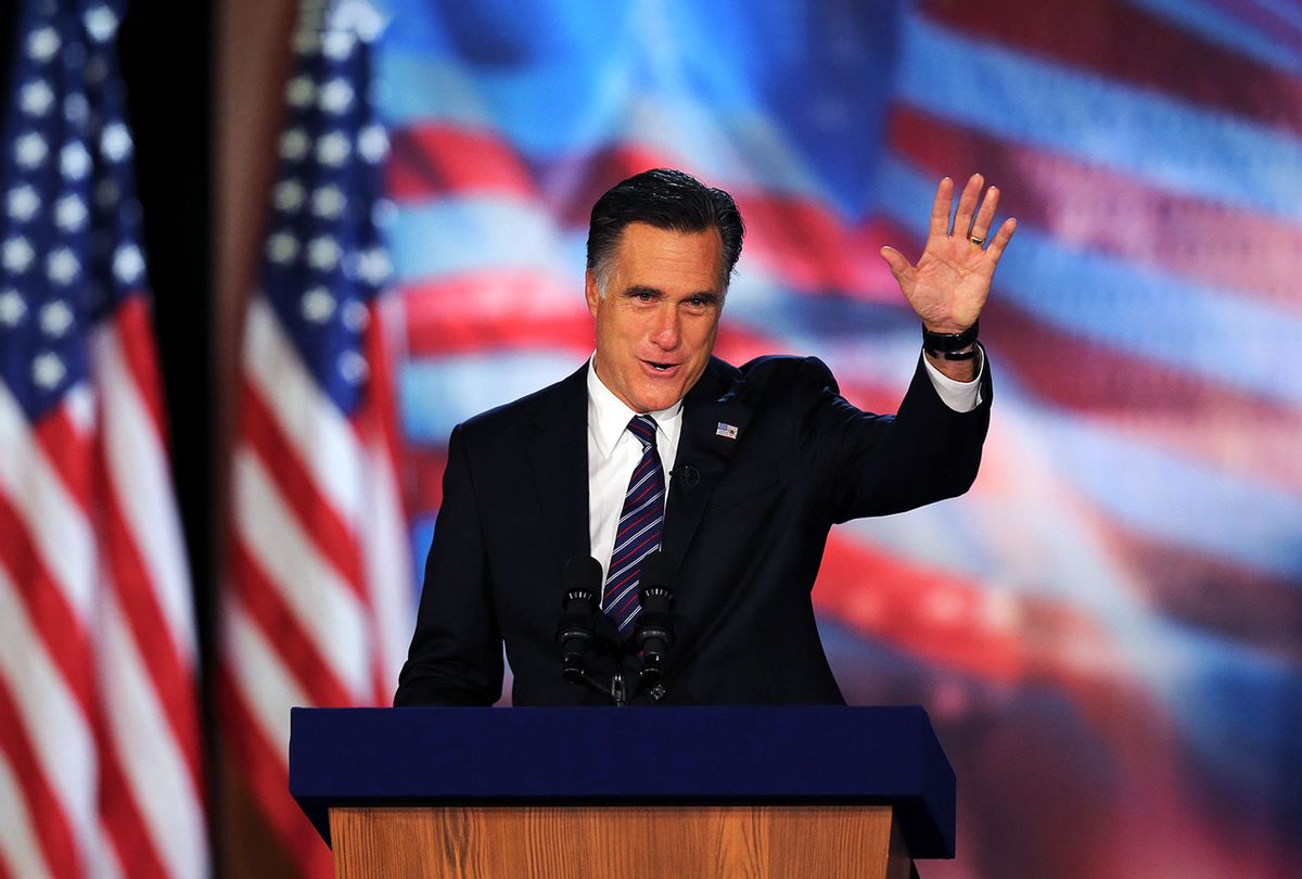 Republican presidential candidate, Mitt Romney, waves to the crowd while speaking at the podium as he concedes the presidency during Mitt Romney's campaign election night event at the Boston Convention & Exhibition Center on November 7, 2012 in Boston, Massachusetts. (Joe Raedle/Getty Images)