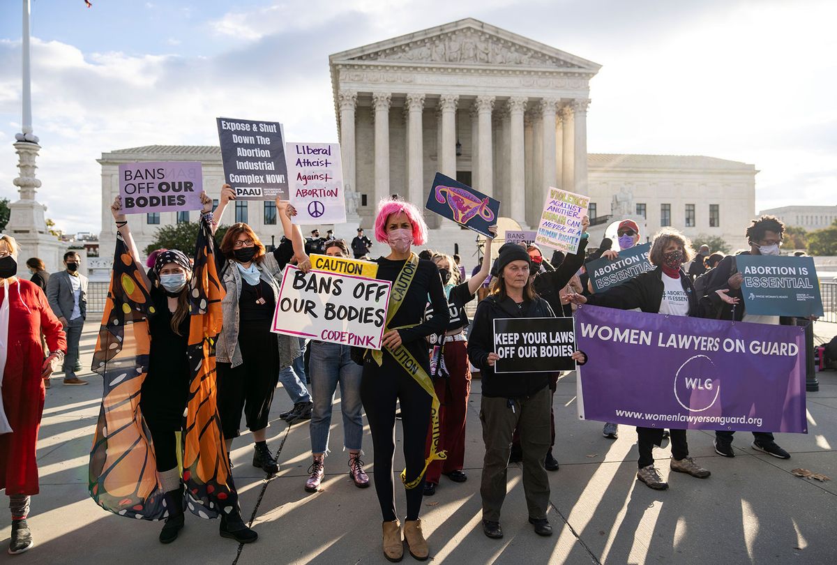 Pro-choice and anti-abortion demonstrators rally outside the U.S. Supreme Court on November 01, 2021 in Washington, DC. On Monday, the Supreme Court is hearing arguments in a challenge to the controversial Texas abortion law which bans abortions after 6 weeks. (Drew Angerer/Getty Images)
