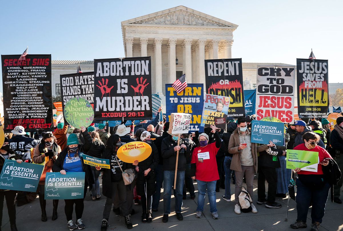Demonstrators gather in front of the U.S. Supreme Court as the justices hear arguments in Dobbs v. Jackson Women's Health, a case about a Mississippi law that bans most abortions after 15 weeks, on December 01, 2021 in Washington, DC.  (Chip Somodevilla/Getty Images)